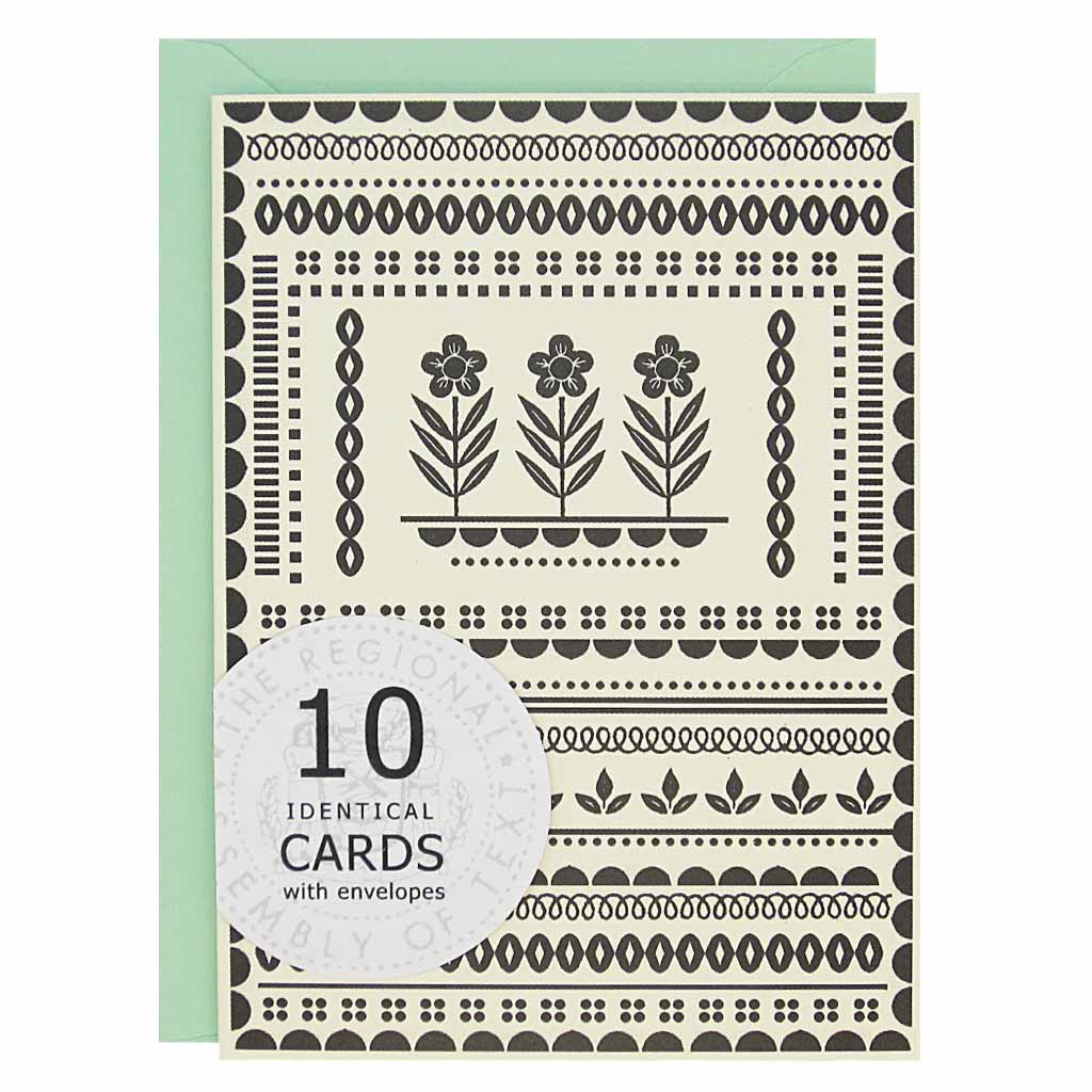 These cards are perfect for any occasion. The cards have a black pattern with three flowers in the center on a cream coloured card. Boxed set contains 10 identical cards (blank inside) & 10 mint envelopes. Cards measure 3½”x 5”. Designed by The Regional Assembly of Text.
