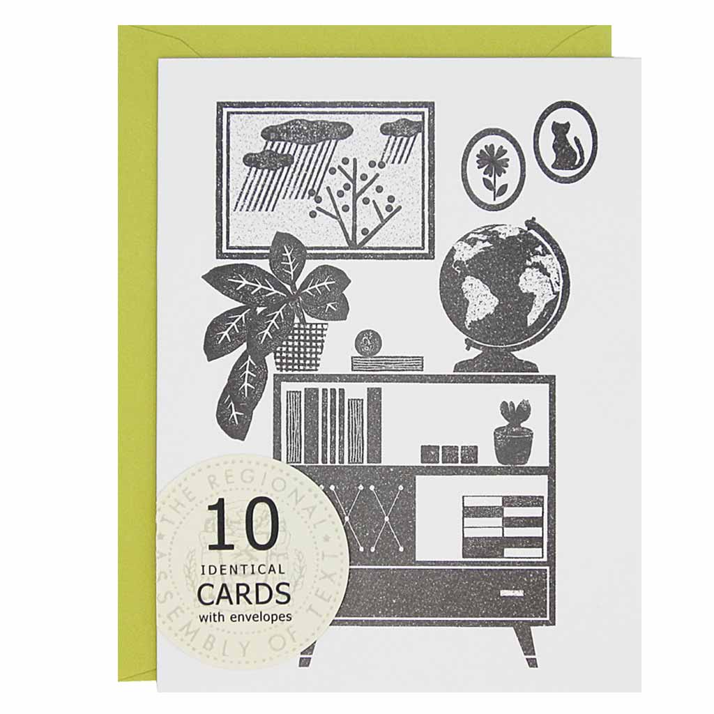 These cards are perfect for any occasion: hello, new home, wish you were here, just to name a few. Features a lino cut inspired image of a dresser with a plant and globe on top, with a few paintings on the wall and books in the bookshelf. Boxed set contains 10 identical cards (blank inside) & 10 chartreuse envelopes. Cards measure 4¼” x 5½”.