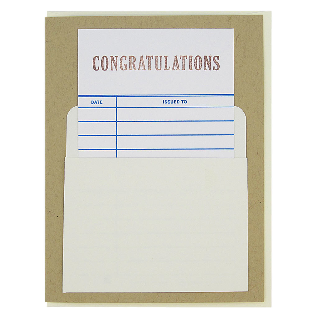 This nostalgic card is kraft coloured and has a real library card that slides in & out of a real library pocket on the front. The top of the library card is stamped ‘Congratulations’. Fill in the date and name of the recipient to personalize. Card measures 4¼” x 5½”, comes with a cream envelope & is blank inside. Designed by The Regional Assembly of Text.
