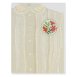 This greeting card is a collage of a pretty taupe blouse with a button of bouquet of orange flowers on the chest.  The button is 1¼” and can be taken off and proudly worn by the recipient. Card measures 4¼” x 5½”, comes with a white envelope & is blank inside. Designed by The Regional Assembly of Text.