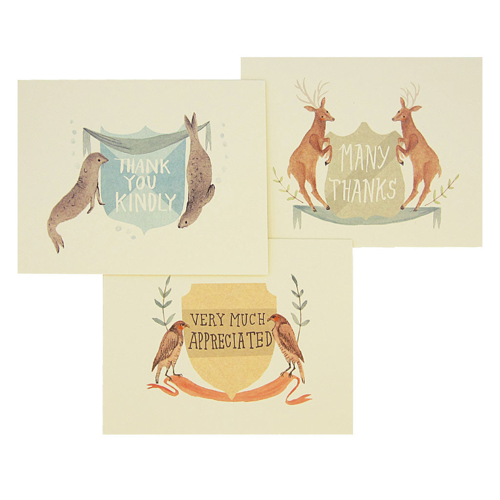 Let these animals help you show your appreciation. There are three different designs of watercolour paintings of seals, deer and hawks. Each card features a set of animals on either side of a crest with a thank you greeting hand drawn inside the crest.Boxed set contains 12 assorted cards (blank inside) & 12 cream envelopes. Includes 4 of each design. Cards measure 4¼” x 5½”.