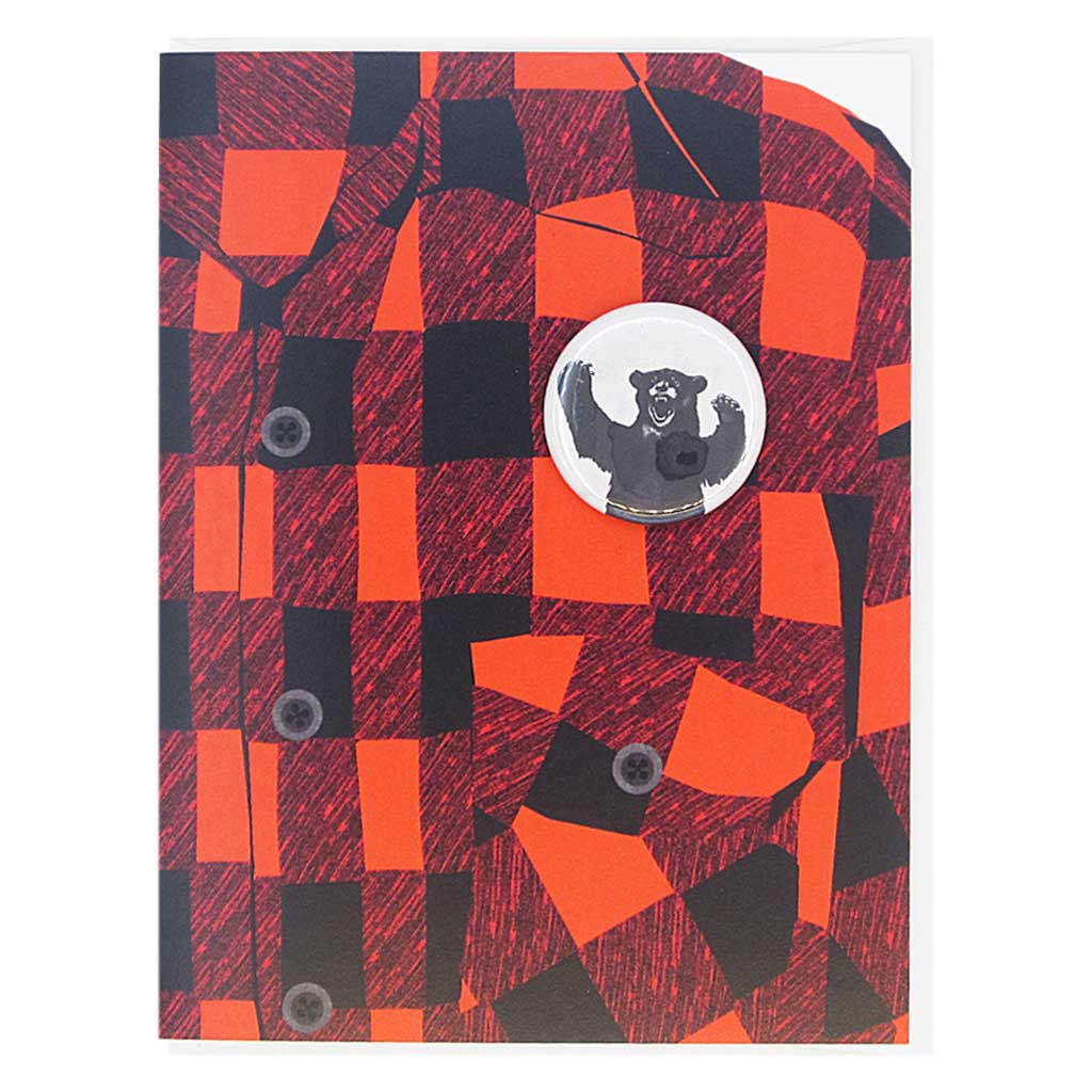 This greeting card is a collage of a classic red and black flannel shirt with a button of a growling bear on the chest.  The button is 1¼” and can be taken off and proudly worn by the recipient. Card measures 4¼” x 5½”, comes with a white envelope & is blank inside. Designed by The Regional Assembly of Text.