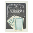 This card says Pick A Card… An Affectionate Prediction for the Enchanting Newlyweds, and has 5 tiny playing cards to choose from attached to the front of the card with a paperclip. Pick one to reveal the future. All fortunes are bright and cheery. Card measures 4¼” x 5½”, comes with a cream envelope & is blank inside. Designed by The Regional Assembly of Text.