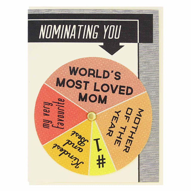 his Mother’s Day card has text at the top that says ‘Nominating You’ and an arrow pointing to a colourful wheel that you can spin to select different sentiments including…#1 Mom, Kindest & Best, World’s Most Loved Mom’. Card measures 4¼” x 5½”, comes with a cream envelope & is blank inside. Designed by The Regional Assembly of Text.