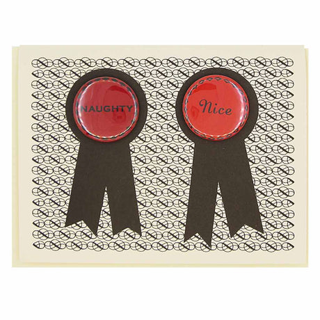 Opposites attract. Features two 1¼” buttons, one that says "Naughty" and the other says "Nice", that can be taken off and proudly worn by the recipients. Card measures 4¼” x 5½”, comes with a cream envelope & is blank inside.