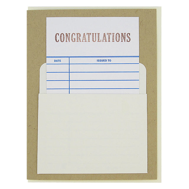 This nostalgic card is kraft  coloured and has a real library card that slides in & out of a real library pocket on the front. The top of the library card is stamped ‘Congratulations’. Fill in the date and name of the recipient to personalize. Card measures 4¼” x 5½”, comes with a cream envelope & is blank inside. Designed by The Regional Assembly of Text.