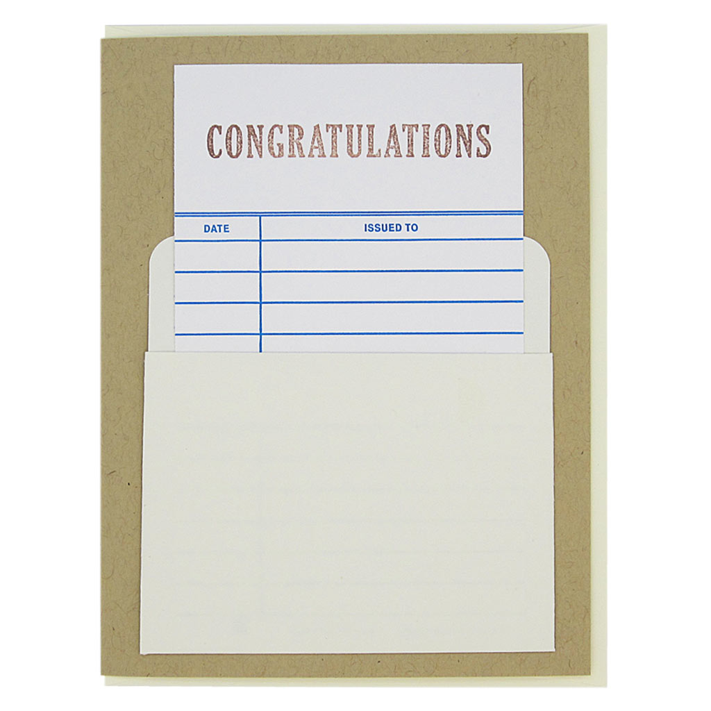 This nostalgic card is kraft  coloured and has a real library card that slides in & out of a real library pocket on the front. The top of the library card is stamped ‘Congratulations’. Fill in the date and name of the recipient to personalize. Card measures 4¼” x 5½”, comes with a cream envelope & is blank inside. Designed by The Regional Assembly of Text.